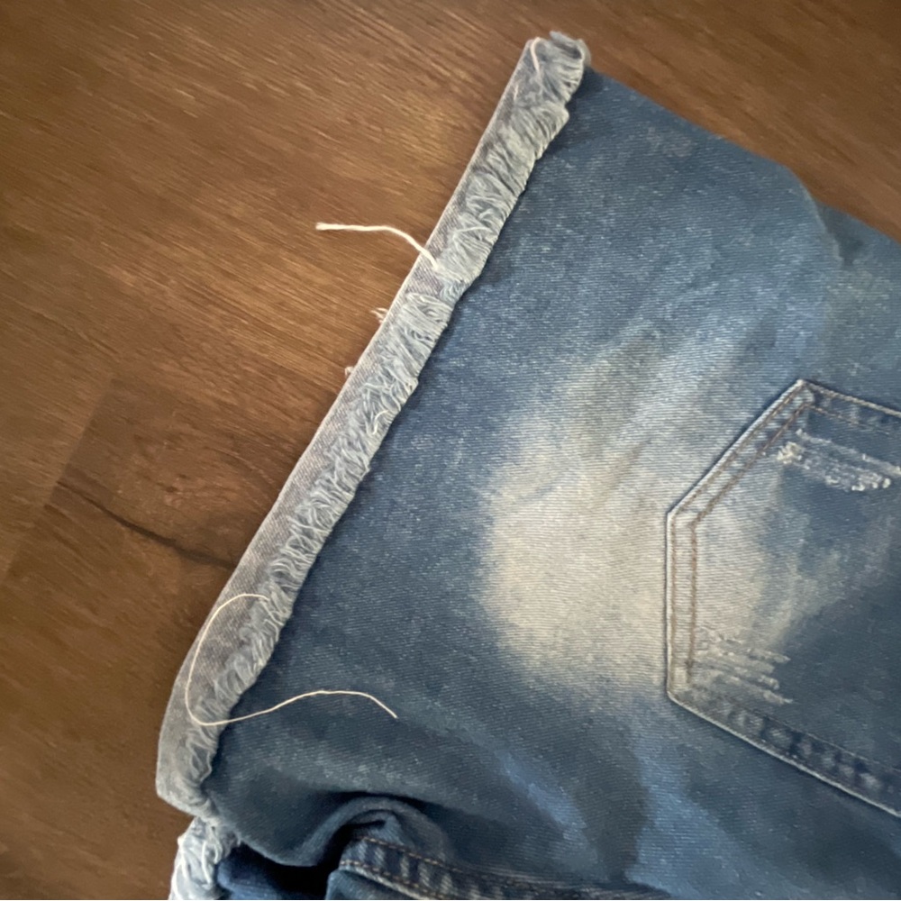Women’s distressed jean shorts.